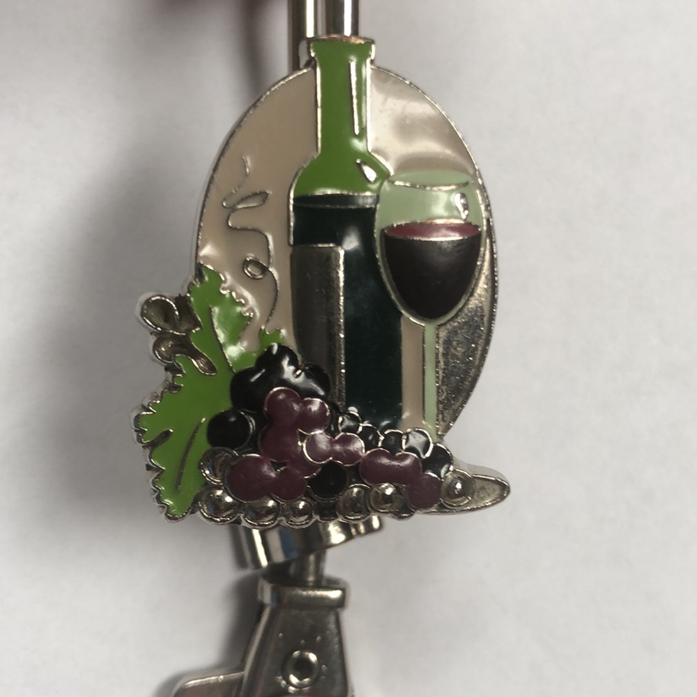 Purse key clip. Clip on opening of purse to find your keys easily. Wine themed